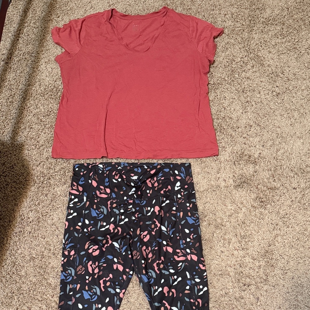 Avia Black dynamic colored leggings and corral colored shirt.